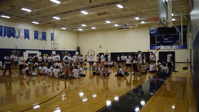 Students in Adler gym preparing for Voluntoona